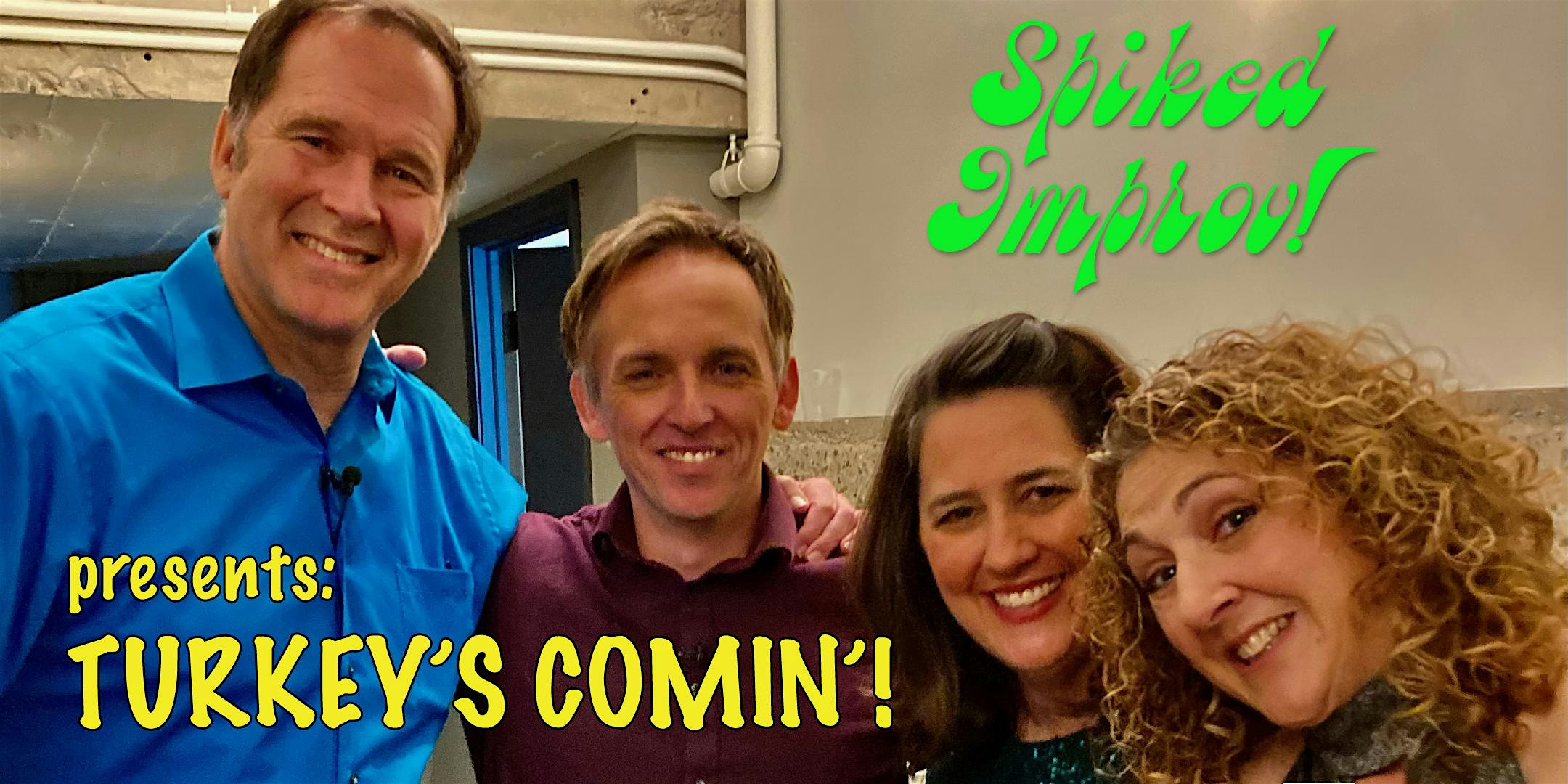 Group of four people smiling for a promo photo with neon green text 'Spiked Improv!' and yellow 'Turkey's Comin'!' across a backstage wall.