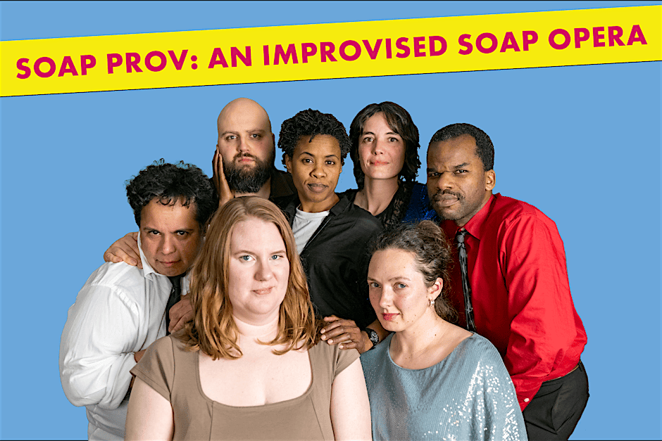 Group of eight diverse performers posing together in front of a blue backdrop, with a yellow banner reading 'SOAP PROV: AN IMPROVISED SOAP OPERA'
